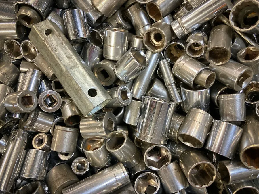 A pile of metal fittings and socket pieces